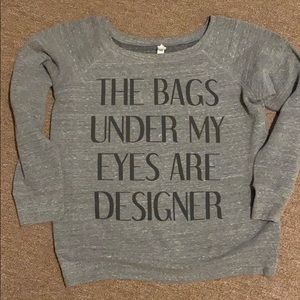 Bags under my eyes are designer sweater size M